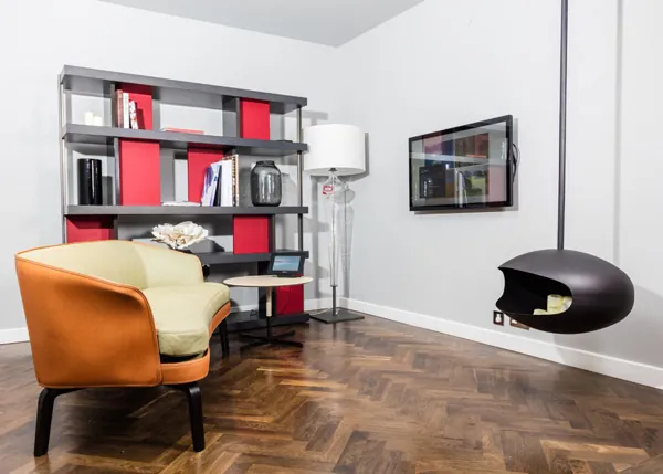 Reading room with bookshelves and a wall-mounted display